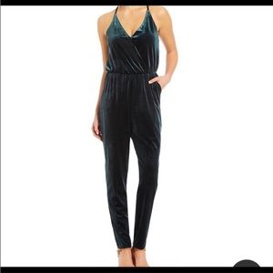 Women’s emerald green velvet jumpsuit size Small from GB